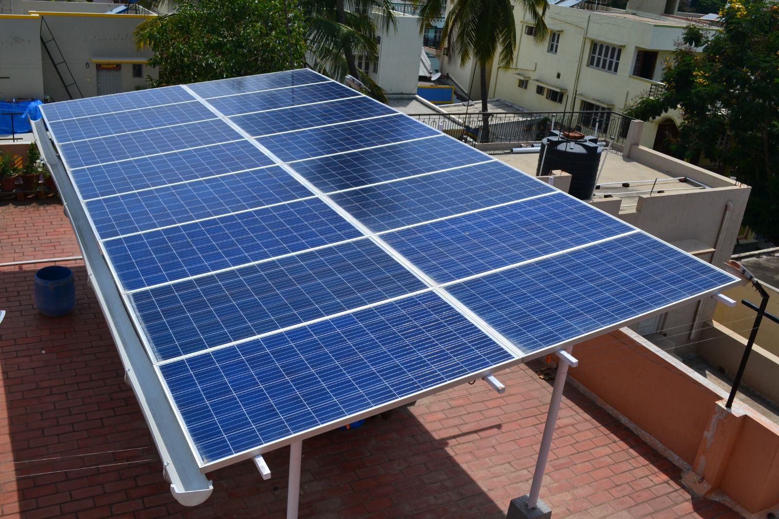 Powergate solar panels on an elevated structure over a home terrace