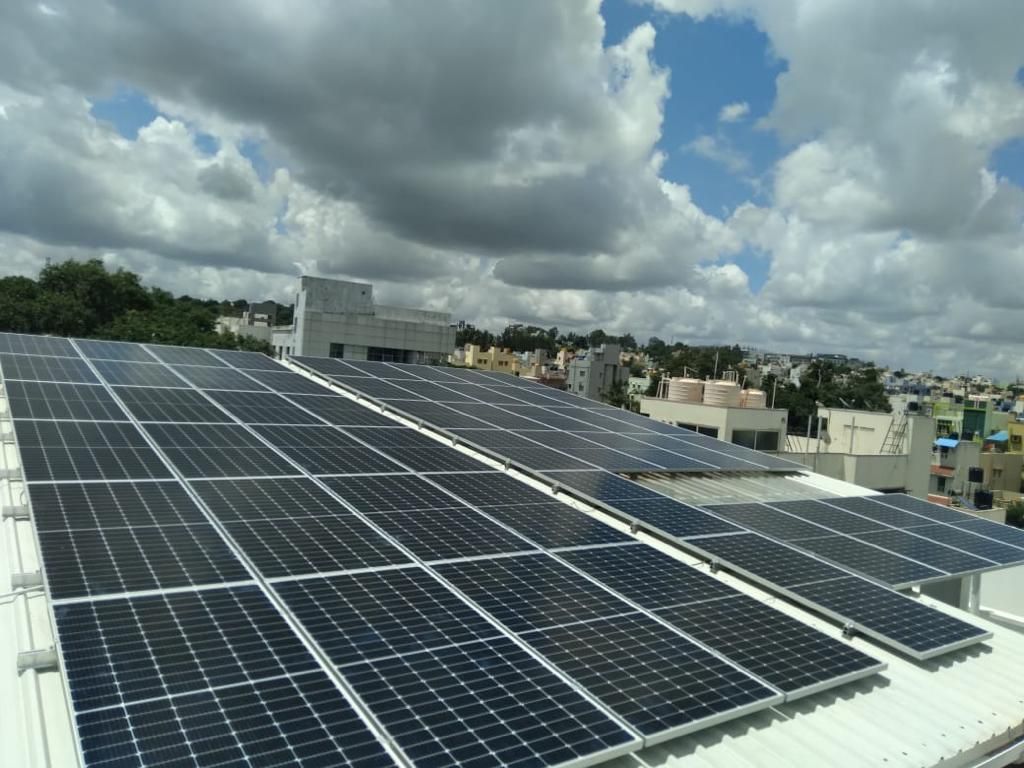 Powergate rooftop array under a cloudy sky